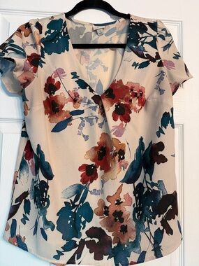 a new day Cream Floral V-Neck Blouse with Teal & Rust Accents